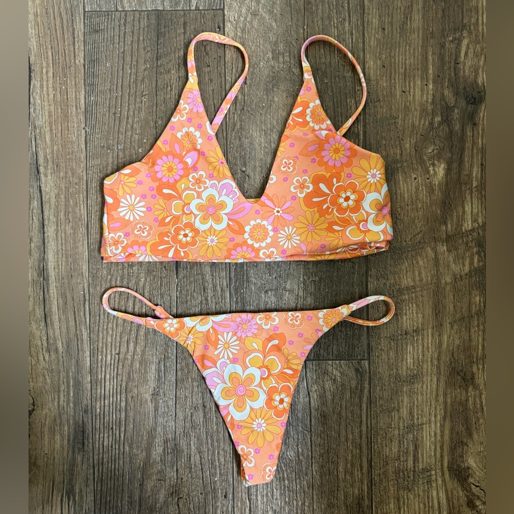 Midori bikinis set. Kalea Rowan top small and Cruz bottom xs. 70s floral design.